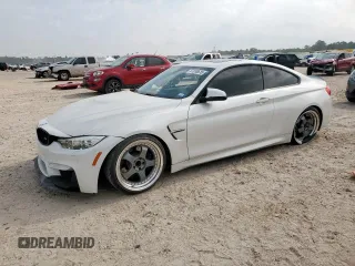 2015 BMW M4 with VIN WBS3R9C5XFK332533, listed as a Copart auction lot 57030615 with 97,739 mi miles and Salvage title. Bid and sale history available at DreamBid. Image 1.