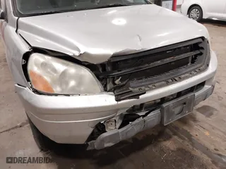 2005 Honda Pilot EX-L with VIN 2HKYF18575H557005, listed as a IAAI auction lot 41647830 with 245,992 mi miles. Bid and sale history available at carsss.com. Image 6.