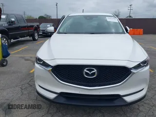 2019 Mazda CX-5 Sport with VIN JM3KFABM4K1565787, listed as a IAAI auction lot 42054585 with 80,580 mi miles and . Bid and sale history available at DreamBid. Image 12.