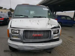 2002 GMC Savana z VIN 1GTGG25R521903285, wystawiony jako Copart lot #66774134 z przebiegiem 145 202 mil mil oraz Szkody całkowita. Historia ofert i sprzedaży dostępna na DreamBid. Obrazek 5.