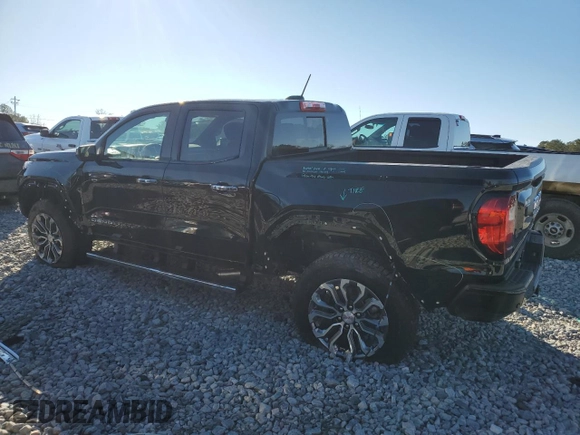 2024 GMC Canyon 4WD Denali with VIN 1GTP6FEK2R1190966, listed as a Copart auction lot 87812495 with 2,143 mi miles and Salvage Title. Bid and sale history available at carsss.com. Image 2.