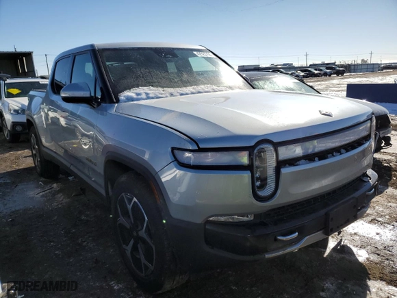 2023 Rivian R1T Adventure with VIN 7FCTGAAA5PN017311, listed as a Copart auction lot 42523755 with 35,039 mi miles and Salvage Title. Bid and sale history available at carsss.com. Image 4.