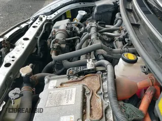 2015 Toyota Prius One z VIN JTDKDTB30F1580908, wystawiony jako IAAI lot #42583483 z przebiegiem 227 830 mil mil oraz . Historia ofert i sprzedaży dostępna na DreamBid. Obrazek 19.