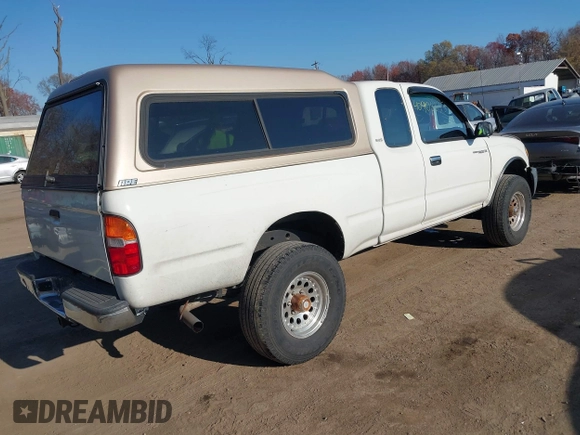 1998 Toyota Tacoma with VIN 4TAWN72N3WZ103586, listed as a IAAI auction lot 40908635 with 197,024 mi miles and . Bid and sale history available at DreamBid. Image 4.