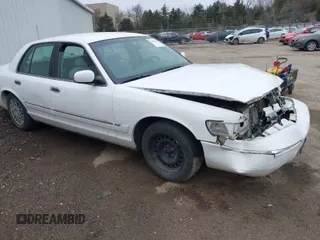 2001 Mercury Grand Marquis GS z VIN 2MEFM74W81X612809, wystawiony jako IAAI lot #41697200 z przebiegiem 160 423 mil mil oraz . Historia ofert i sprzedaży dostępna na DreamBid. Obrazek 1.