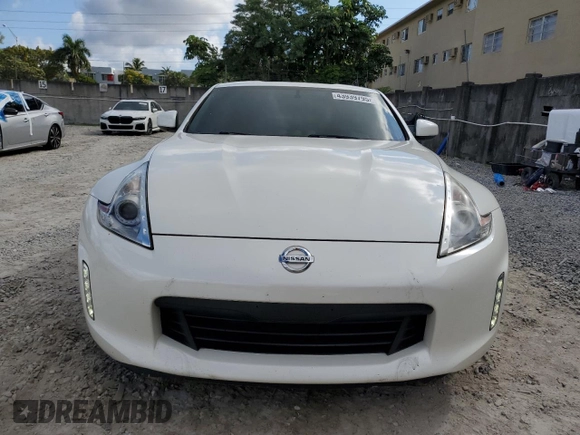 2014 Nissan 370Z Touring with VIN JN1AZ4EH6EM630690, listed as a Copart auction lot 43939795 with 66,797 mi miles and Salvage Title. Bid and sale history available at carsss.com. Image 5.