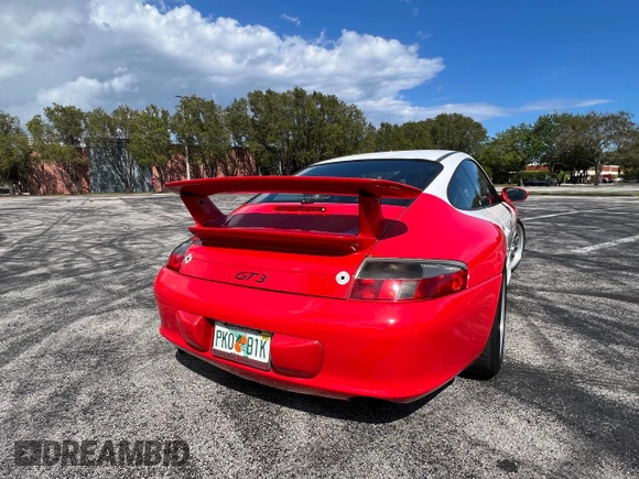 2004 Porsche 911 z VIN WP0AC299X4S692464, wystawiony jako Copart lot #50950705 z przebiegiem 44 494 mil mil oraz Czysty tytuł • Clean title. Historia ofert i sprzedaży dostępna na DreamBid. Obrazek 6.