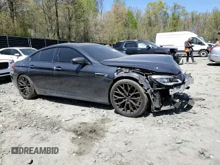 2016 BMW M6 with VIN WBS6E9C5XGG437084, listed as a Copart auction lot 53632315 with 108,151 mi miles and Salvage title. Bid and sale history available at DreamBid. Image 11.