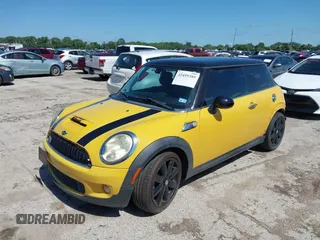 2009 MINI Hardtop S with VIN WMWMF73579TW86675, listed as a IAAI auction lot 42459385 with 129,264 mi miles and . Bid and sale history available at DreamBid. Image 2.