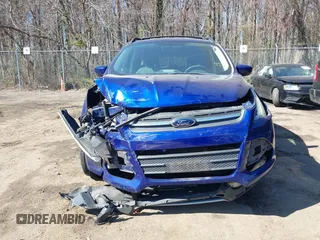 2013 Ford Escape SE with VIN 1FMCU9GX5DUB20394, listed as a IAAI auction lot 41889989 with 121,417 mi miles. Bid and sale history available at carsss.com. Image 11.