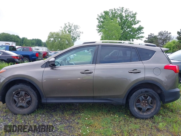 2013 Toyota RAV4 LE with VIN 2T3BFREV2DW077017, listed as a IAAI auction lot 42456065 with 164,811 mi miles and . Bid and sale history available at DreamBid. Image 14.