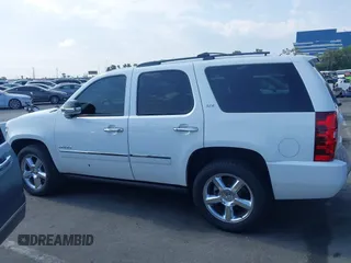 2013 Chevrolet Tahoe LTZ with VIN 1GNSKCE04DR374682, listed as a IAAI auction lot 42779526 with 139,533 mi miles and . Bid and sale history available at DreamBid. Image 14.
