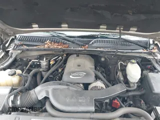 2005 Chevrolet Suburban LT z VIN 3GNEC16ZX5G197892, wystawiony jako IAAI lot #42045100 z przebiegiem 262 665 mil mil oraz . Historia ofert i sprzedaży dostępna na DreamBid. Obrazek 10.