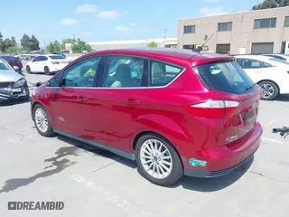 2014 Ford C-Max Energi SEL with VIN 1FADP5CU6EL502547, listed as a IAAI auction lot 42057583 with 83,026 mi miles. Bid and sale history available at carsss.com. Image 3.