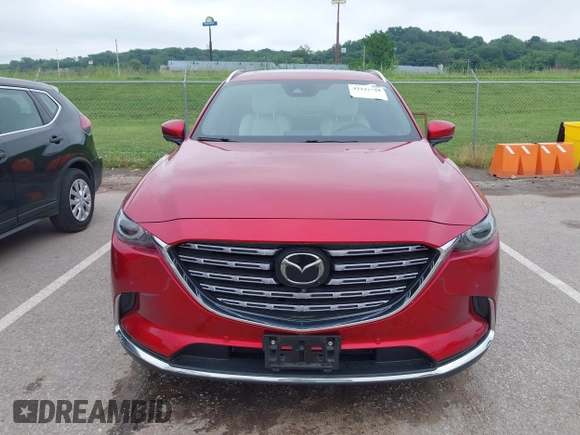 2021 Mazda CX-9 Signature with VIN JM3TCBEY9M0511928, listed as a IAAI auction lot 42231925 with 26,367 mi miles and . Bid and sale history available at DreamBid. Image 12.