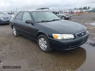 2000 Toyota Camry CE with VIN JT2BG22KXY0432288, listed as a IAAI auction lot 41927856 with 203,035 mi miles. Bid and sale history available at carsss.com. Image 1.