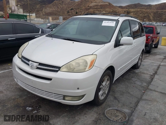 2004 Toyota Sienna XLE with VIN 5TDZA22C94S084569, listed as a IAAI auction lot 41482040 with 210,157 mi miles and . Bid and sale history available at DreamBid. Image 19.