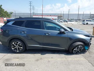 2023 Kia Sportage EX with VIN KNDPVCAG4P7014112, listed as a IAAI auction lot 42610022 with 50,680 mi miles and . Bid and sale history available at DreamBid. Image 14.