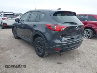 2016 Mazda CX-5 Sport with VIN JM3KE2BY4G0858100, listed as a IAAI auction lot 41368135 with 93,435 mi miles. Bid and sale history available at carsss.com. Image 3.