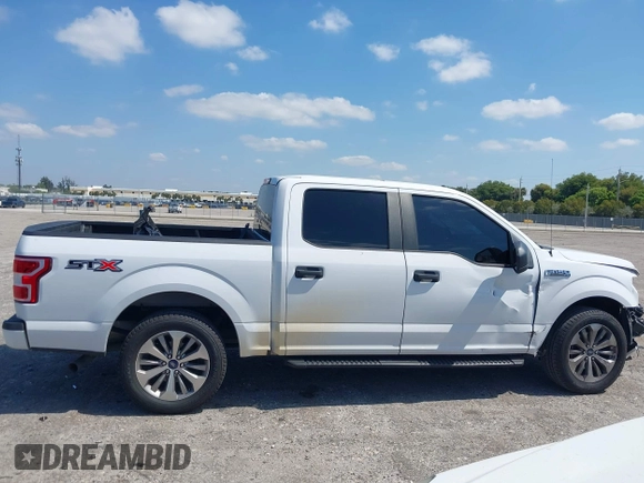 2018 Ford F-150 XL with VIN 1FTEW1CP8JKE91006, listed as a IAAI auction lot 42123840 with 76,806 mi miles and . Bid and sale history available at DreamBid. Image 14.