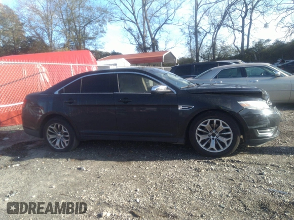 2014 Ford Taurus Limited with VIN 1FAHP2F80EG101504, listed as a IAAI auction lot 40974783 with 177,522 mi miles. Bid and sale history available at carsss.com. Image 13.