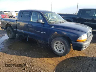 2001 Dodge Dakota Sport z VIN 1B7HL2AN51S225570, wystawiony jako Copart lot #66186174 z przebiegiem 295 142 mil mil oraz Szkoda całkowita • Salvage title. Historia ofert i sprzedaży dostępna na DreamBid. Obrazek 4.