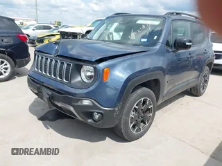 2023 Jeep Renegade Latitude with VIN ZACNJDB10PPP70488, listed as a IAAI auction lot 42224200 with 32,957 mi miles and . Bid and sale history available at carsss.com. Image 2.