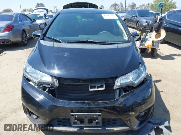 2015 Honda Fit EX-L z VIN 3HGGK5H85FM717646, wystawiony jako IAAI lot #42483387 z przebiegiem 137 296 mil mil oraz . Historia ofert i sprzedaży dostępna na DreamBid. Obrazek 11.