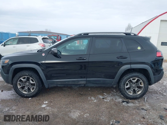 2019 Jeep Cherokee Trailhawk Elite with VIN 1C4PJMBX6KD313675, listed as a IAAI auction lot 41448924 with 51,639 mi miles. Bid and sale history available at carsss.com. Image 14.