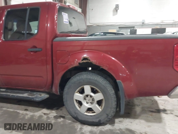 2006 Nissan Frontier LE z VIN 1N6AD07W26C403503, wystawiony jako IAAI lot #41928338 z przebiegiem 163 205 mil mil oraz . Historia ofert i sprzedaży dostępna na DreamBid. Obrazek 6.