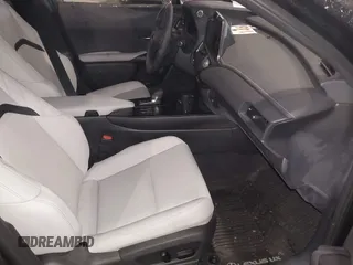 2025 Lexus UX with VIN JTHUCJDH8S2003698, listed as a IAAI auction lot 41368424 with 1,111 mi miles. Bid and sale history available at carsss.com. Image 5.