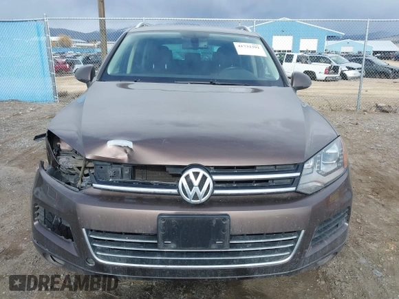 2013 Volkswagen Touareg Lux with VIN WVGEF9BP1DD012851, listed as a IAAI auction lot 41732391 with 123,283 mi miles and . Bid and sale history available at DreamBid. Image 13.