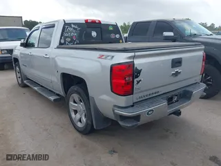 2014 Chevrolet Silverado 1500 LTZ with VIN 3GCUKSEC9EG228849, listed as a IAAI auction lot 41940320 with 165,630 mi miles. Bid and sale history available at carsss.com. Image 3.