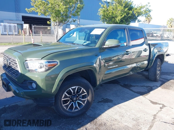2021 Toyota Tacoma SR with VIN 3TMCZ5AN7MM395940, listed as a IAAI auction lot 41240832 with 39,338 mi miles and . Bid and sale history available at DreamBid. Image 2.