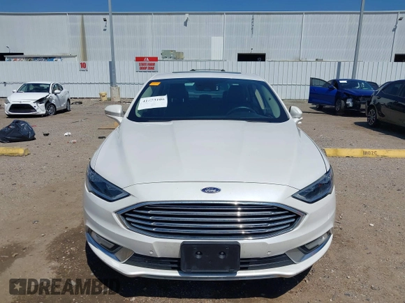 2017 Ford Fusion Titanium with VIN 3FA6P0SUXHR147336, listed as a IAAI auction lot 41873106 with 103,247 mi miles and . Bid and sale history available at DreamBid. Image 12.