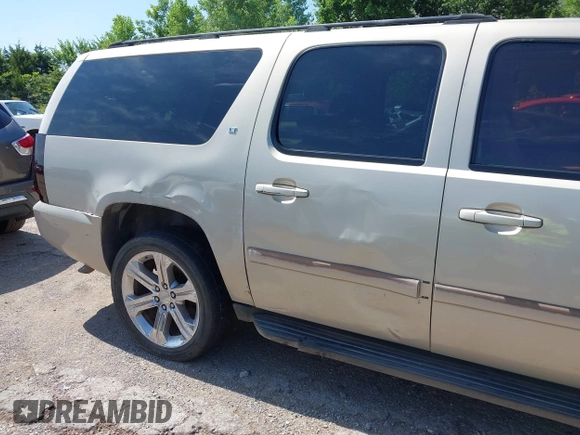 2007 Chevrolet Suburban LS with VIN 1GNFC16087J218794, listed as a IAAI auction lot 42700630 with 262,428 mi miles and . Bid and sale history available at DreamBid. Image 13.