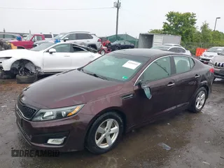 2014 Kia Optima LX z VIN 5XXGM4A73EG270576, wystawiony jako IAAI lot #42335343 z przebiegiem 207 000 mil mil oraz . Historia ofert i sprzedaży dostępna na DreamBid. Obrazek 2.