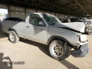 1998 Nissan Frontier XE with VIN 1N6DD21S1WC329392, listed as a Copart auction lot 73609304 with Not provided miles and Salvage title. Bid and sale history available at DreamBid. Image 4.