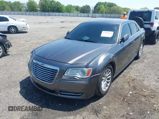 2014 Chrysler 300 with VIN 2C3CCAAG3EH237157, listed as a IAAI auction lot 41986053 with 61,372 mi miles and . Bid and sale history available at DreamBid. Image 6.