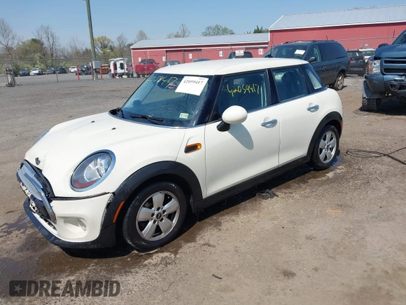 2015 MINI Hardtop 4 Door with VIN WMWXS5C53FT832742, listed as a IAAI auction lot 42059417 with 114,671 mi miles and . Bid and sale history available at DreamBid. Image 2.