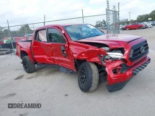 2022 Toyota Tacoma SR with VIN 3TYAX5GN1NT039848, listed as a IAAI auction lot 41210811 with 93,670 mi miles and . Bid and sale history available at DreamBid. Image 6.