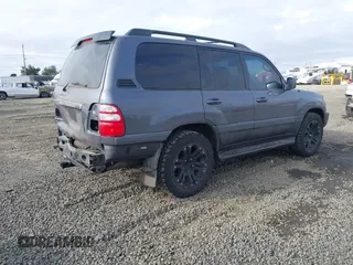 2005 Toyota Land Cruiser with VIN JTEHT05J852069392, listed as a IAAI auction lot 41450782 with 187,949 mi miles. Bid and sale history available at carsss.com. Image 4.