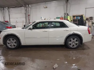 2006 Chrysler 300 Touring with VIN 2C3LK53G76H518015, listed as a IAAI auction lot 41440502 with 117,789 mi miles. Bid and sale history available at carsss.com. Image 14.