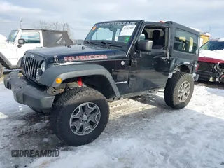 2013 Jeep Wrangler Rubicon 10th Anniversary with VIN 1C4BJWCG3DL591186, listed as a IAAI auction lot 41315969 with 54,984 mi miles and . Bid and sale history available at DreamBid. Image 2.
