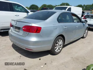 2012 Volkswagen Jetta SE with VIN 3VWBP7AJXCM340937, listed as a IAAI auction lot 42526373 with 157,113 mi miles and . Bid and sale history available at DreamBid. Image 4.