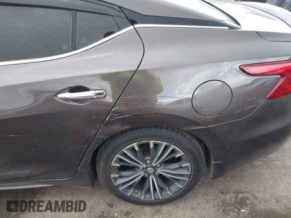 2016 Nissan Maxima SV with VIN 1N4AA6AP0GC904168, listed as a IAAI auction lot 41865822 with 121,999 mi miles and . Bid and sale history available at DreamBid. Image 18.