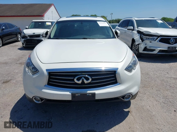 2014 Infiniti QX70 with VIN JN8CS1MU7EM451098, listed as a IAAI auction lot 42026803 with 126,605 mi miles and . Bid and sale history available at DreamBid. Image 12.