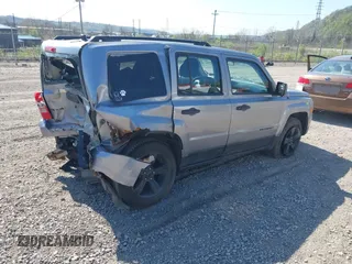 2015 Jeep Patriot High Altitude with VIN 1C4NJRAB9FD353751, listed as a IAAI auction lot 42099206 with 62,569 mi miles. Bid and sale history available at carsss.com. Image 4.