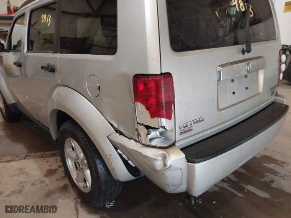 2007 Dodge Nitro SLT with VIN 1D8GU58K97W616455, listed as a IAAI auction lot 41229813 with 199,421 mi miles. Bid and sale history available at carsss.com. Image 6.