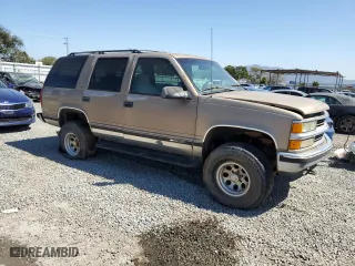 1995 Chevrolet Tahoe with VIN 1GNEK13K4SJ434901, listed as a Copart auction lot 49673995 with 23,917 mi miles and Clean Title. Bid and sale history available at carsss.com. Image 4.